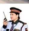 A.S.S. Security female guard in uniform with walkie-talkie